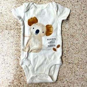 Carter’s “Mommy’s Little Hugger” onesie. 0-3 month.